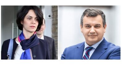 Two professionals, a woman on the left wearing a scarf and a man on the right in a blue suit, pictured side by side outdoors/entrance area.