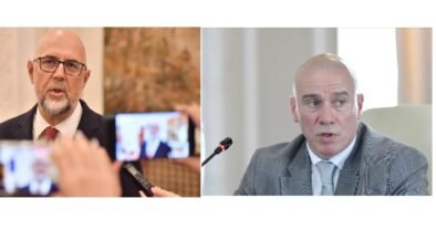 Two men shown in a split image: left, a bearded man with glasses speaking to a crowd; right, a bald man in a gray suit at a microphone.