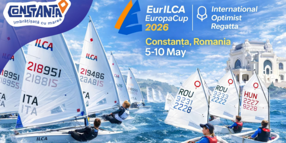 Sailing boats racing in a regatta off Constanța, Romania, with event logos and the date 5–10 May 2026 in the blue sky background.