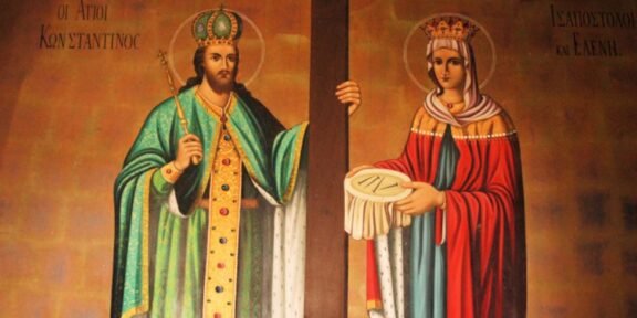 Iconic painting of Saint Constantine (left) and Saint Helen (right) with a wooden cross between them.