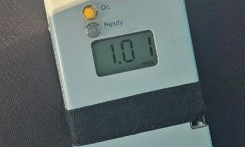 Handheld dosing device showing 1.0 ml dose, with On and Ready indicators visible.