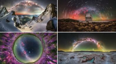 Snowy mountain peaks at twilight with an arc of stars and aurora overhead against a dark sky.