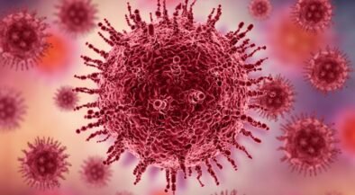 Close-up illustration of a red virus particle with spike proteins against a pink-purple blurred background.