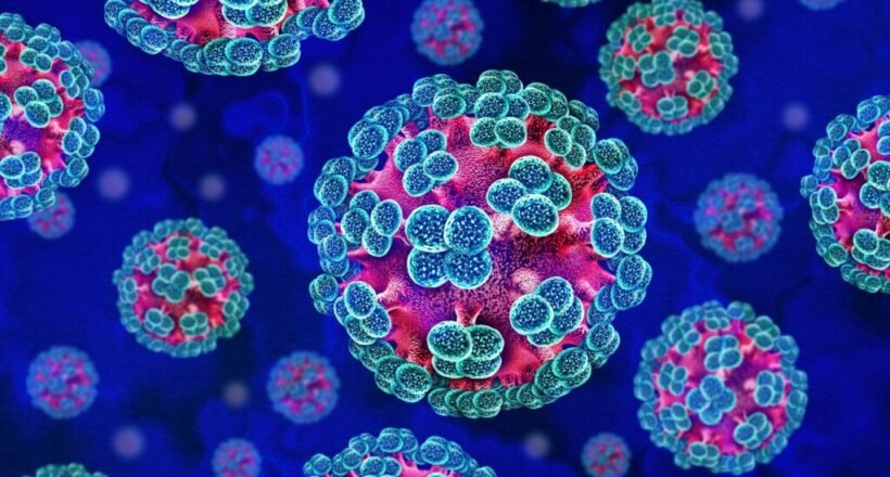 Colorized illustration of multiple spherical viruses with blue spike proteins on a blue background, showing a cluster of coronavirus-like particles.