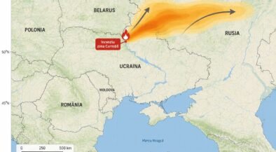 Map of eastern Europe showing a wildfire near Chernobyl in Ukraine, with an orange plume extending northeast toward Russia.
