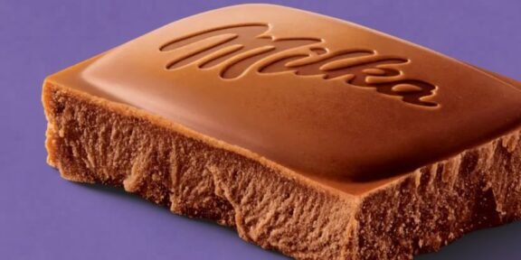 Milk chocolate bar with the Milka logo embossed on a purple background.
