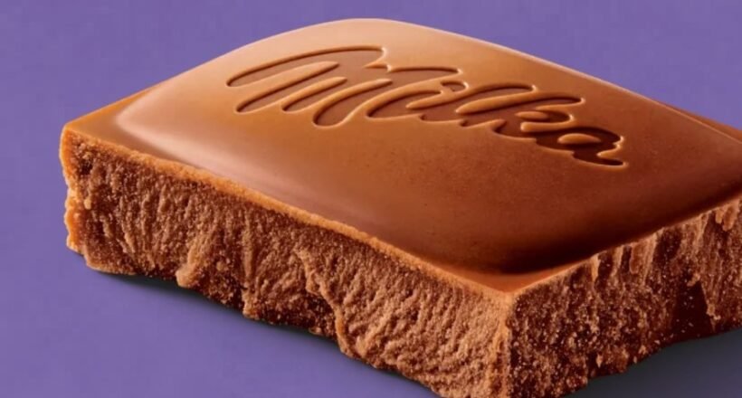 Milk chocolate bar with the Milka logo embossed on a purple background.