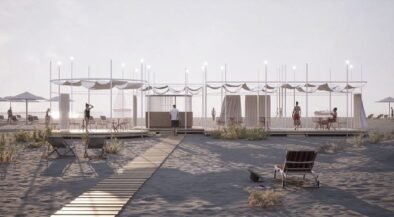 Open-air beach cabanas with white canopies along a wooden boardwalk, string lights, and beachgoers relaxing nearby on a sandy shore.