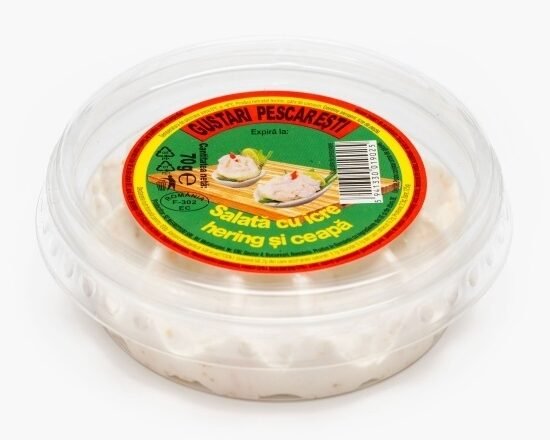 Plastic tub of fish salad spread with a bright red–green–yellow label, featuring text and a small image of the dish (herring and onion) on top.