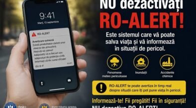 Hand holding a smartphone with a RO-ALERT warning notification.