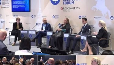 Panel discussion at the St. Petersburg International Economic Forum with five speakers on stage and audience in foreground.